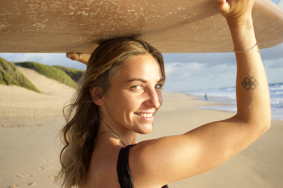 Happy retreat guest at Art of Connection yoga and surf retreat Ericeira