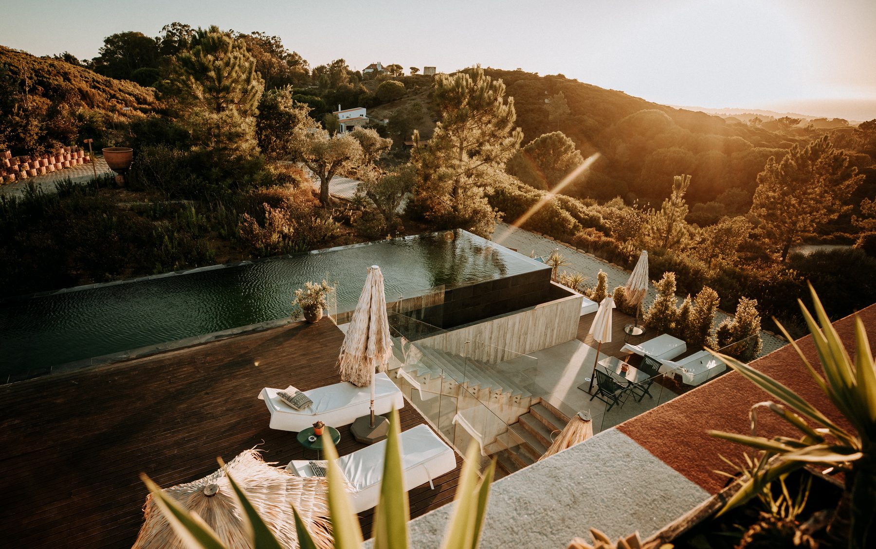 Villa Epicurea infinity pool at golden hour — Priceless Peace retreat Sesimbra